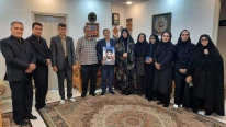 دیدار رئیس دانشگاه ملی مهارت واحد استانی گلستان با خانواده شهید مومنی مقدم به مناسبت هفته دفاع مقدس